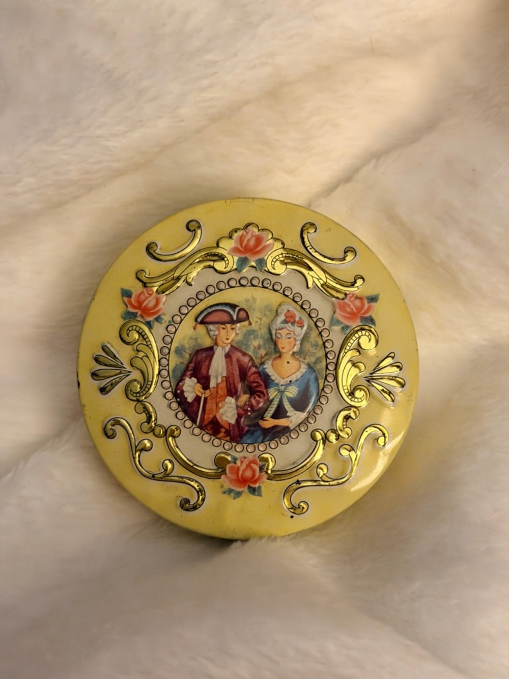 Vintage Baret Ware embossed metal tin box with 18th-century couple.